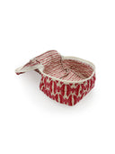 cream quilted travel bag with pink bird pattern