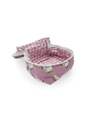 light pink quilted travel bag with white chicken pattern