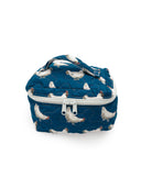 blue quilted travel bag with white chicken pattern 