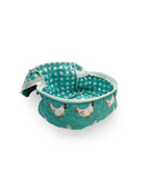 turquoise qulited travel bag with white chicken pattern