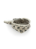 Fabric travel bag with donkey pattern on a white background