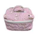 light pink quilted travel case with farmstead pattern