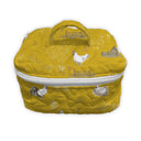 yellow quilted travel bag with farm pattern