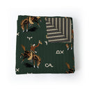 Folded fabric with cowboy and horse pattern on a white background