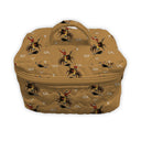 brown quilted travel bag with bronc on it