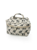 Patterned fabric bag with a handle on a white background