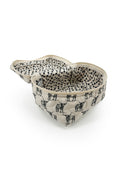 fabric bag with black and white longhorn pattern on a white background