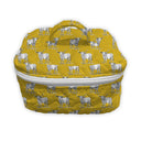mustard yellow quilted travel bag with white longhorn pattern