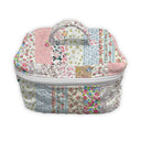 Floral patterned fabric bag on a white background