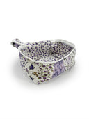 purple and white floral travel bag