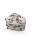 Floral-patterned travel case on a white background