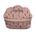 Pink travel bag with boot print on a white background