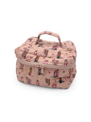 Pink travel bag with boot print on a white background