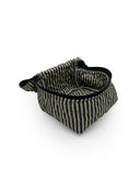 cosmetic bag with striped pattern on a white background